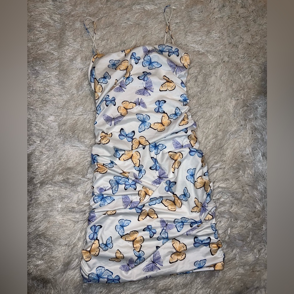 Brand: Windsor size: Medium color: blue, yellow and white butterfly design